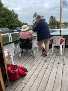 A resident enjoys a boat trip during an outing