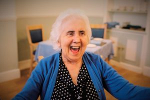 smiling residential care home resident